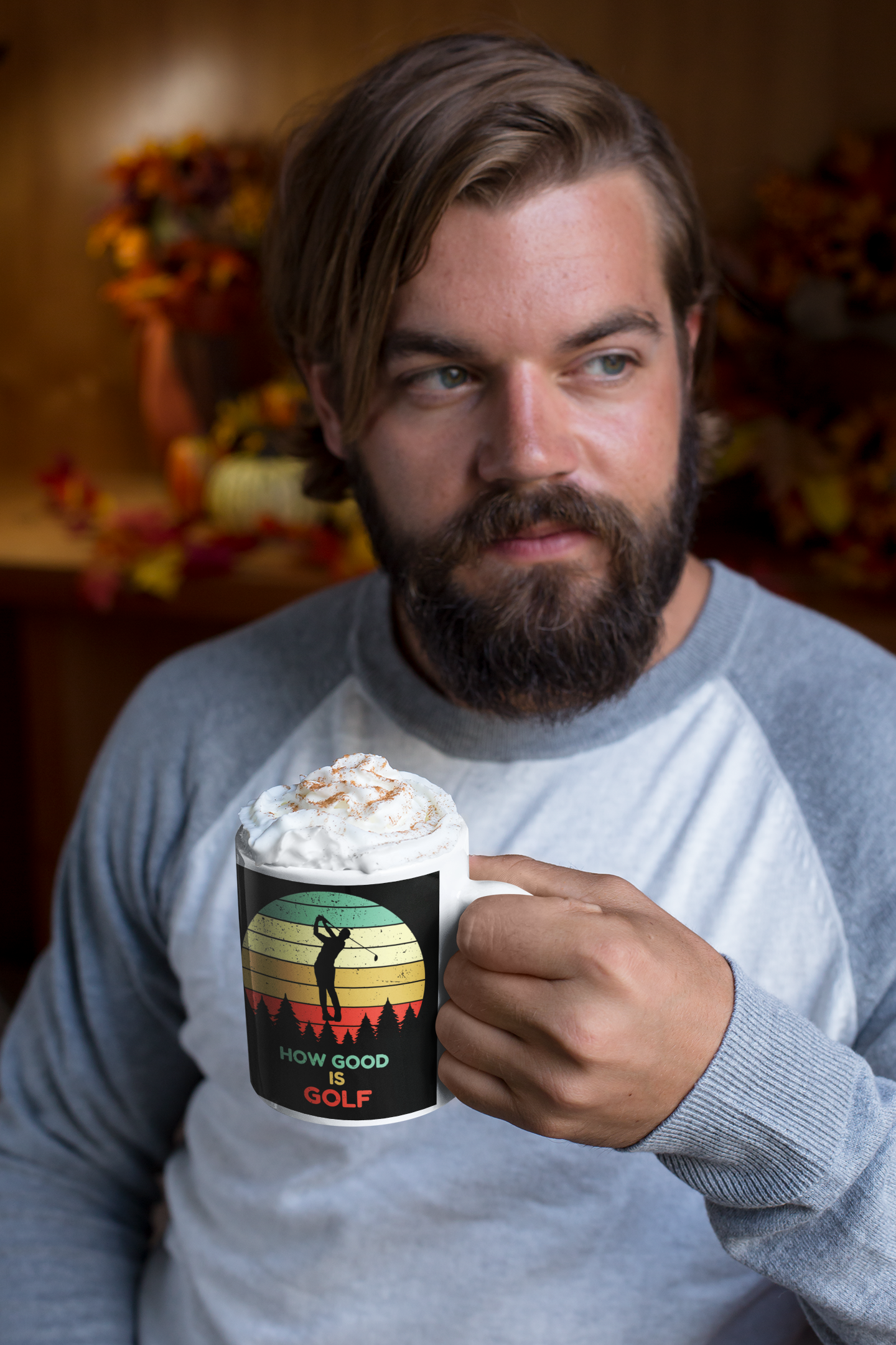 Retro-style coffee mug with forest and sunset golf scene