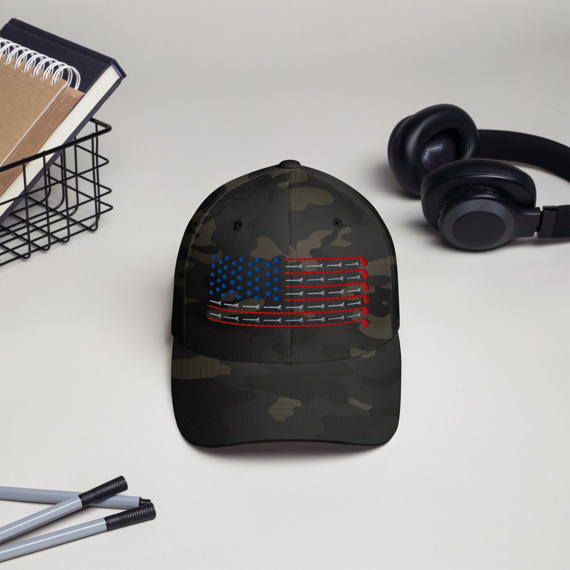 camo flexfit cap with embroidered red white blue flag