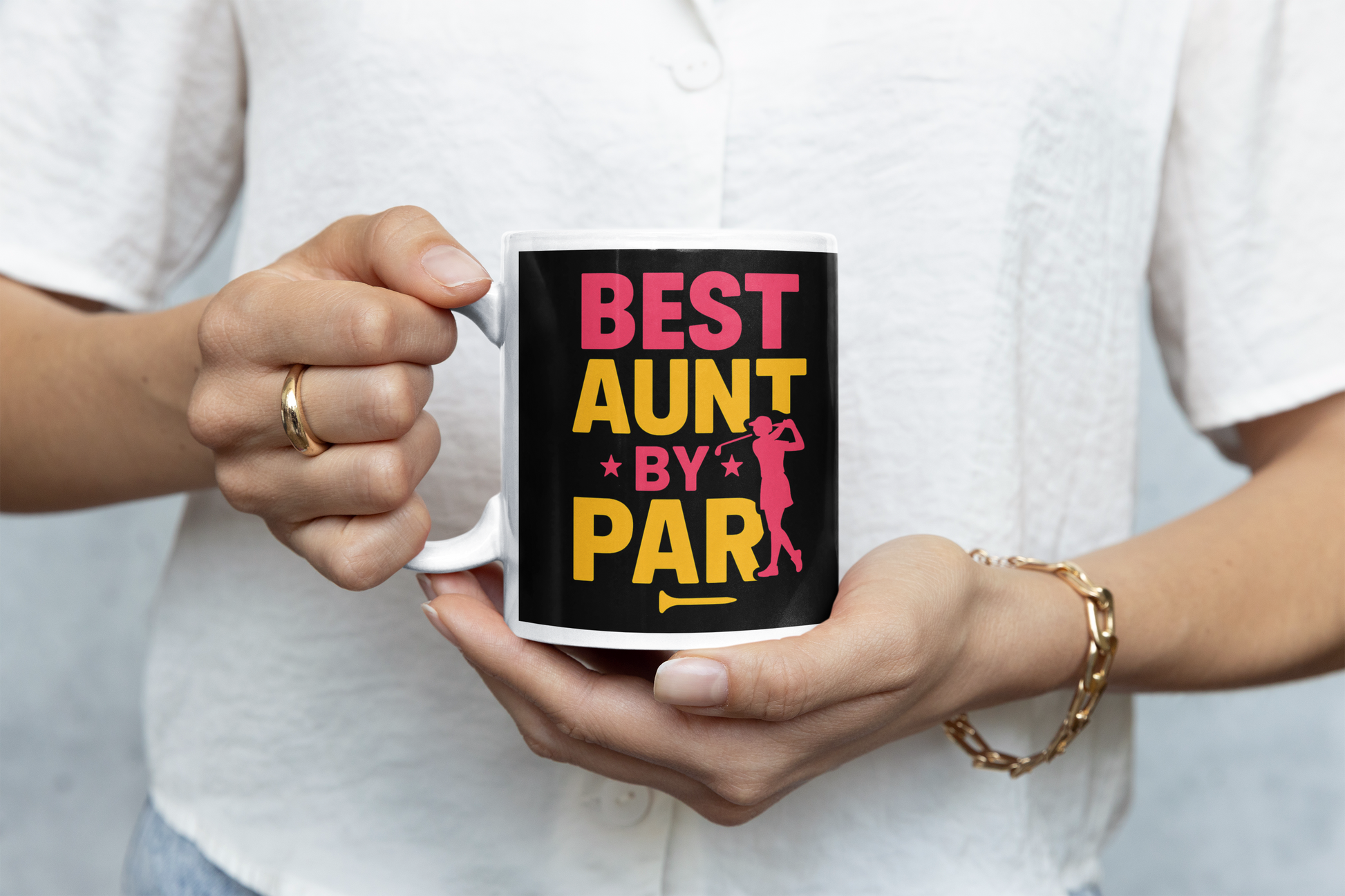 Funny gift mug for golf-playing aunts with pink and yellow text