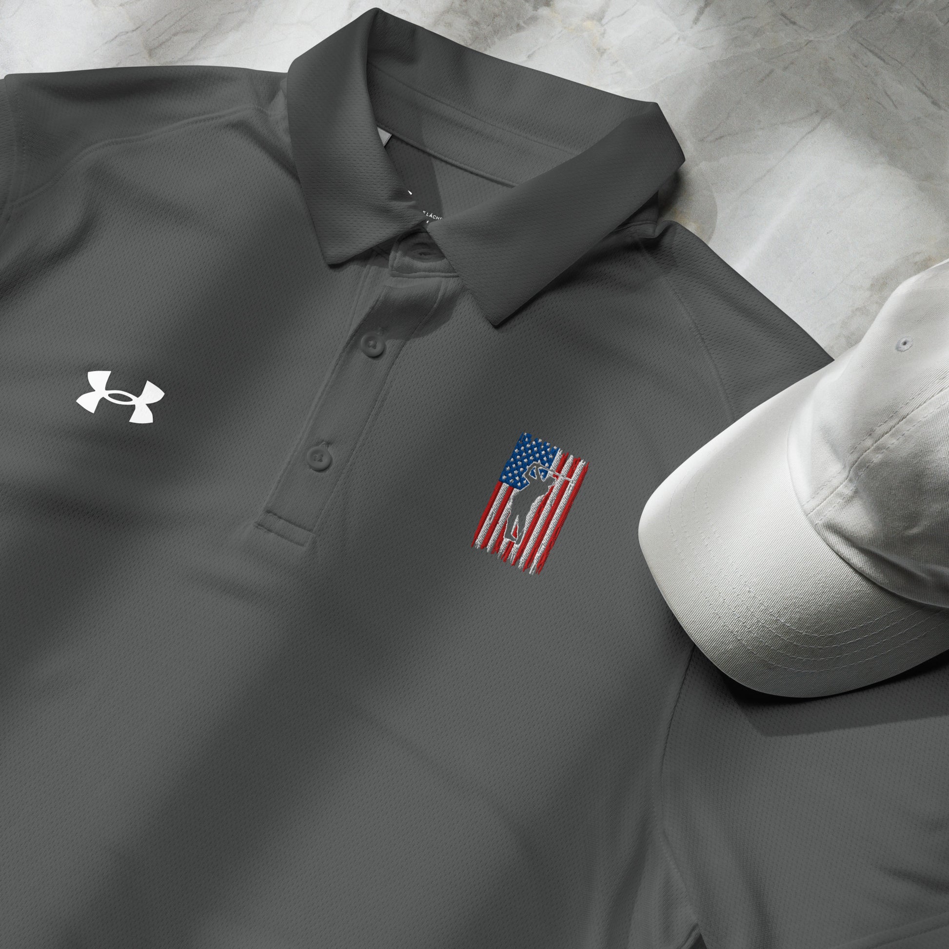 Gray golf polo with stitched American flag and golfer swing