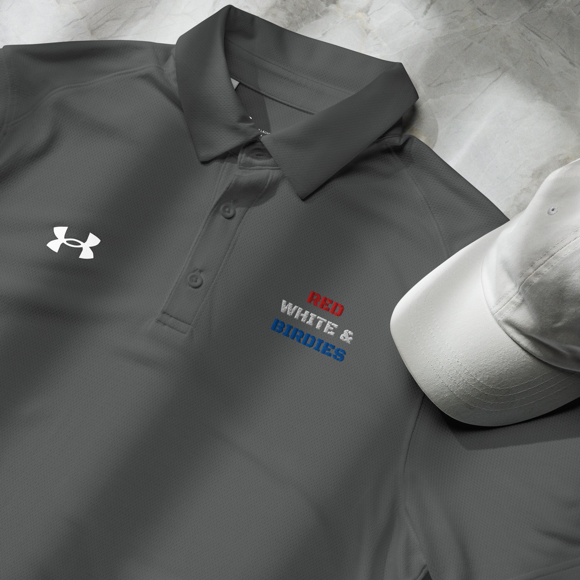 grey under armour polo with colorful patriotic golf quote