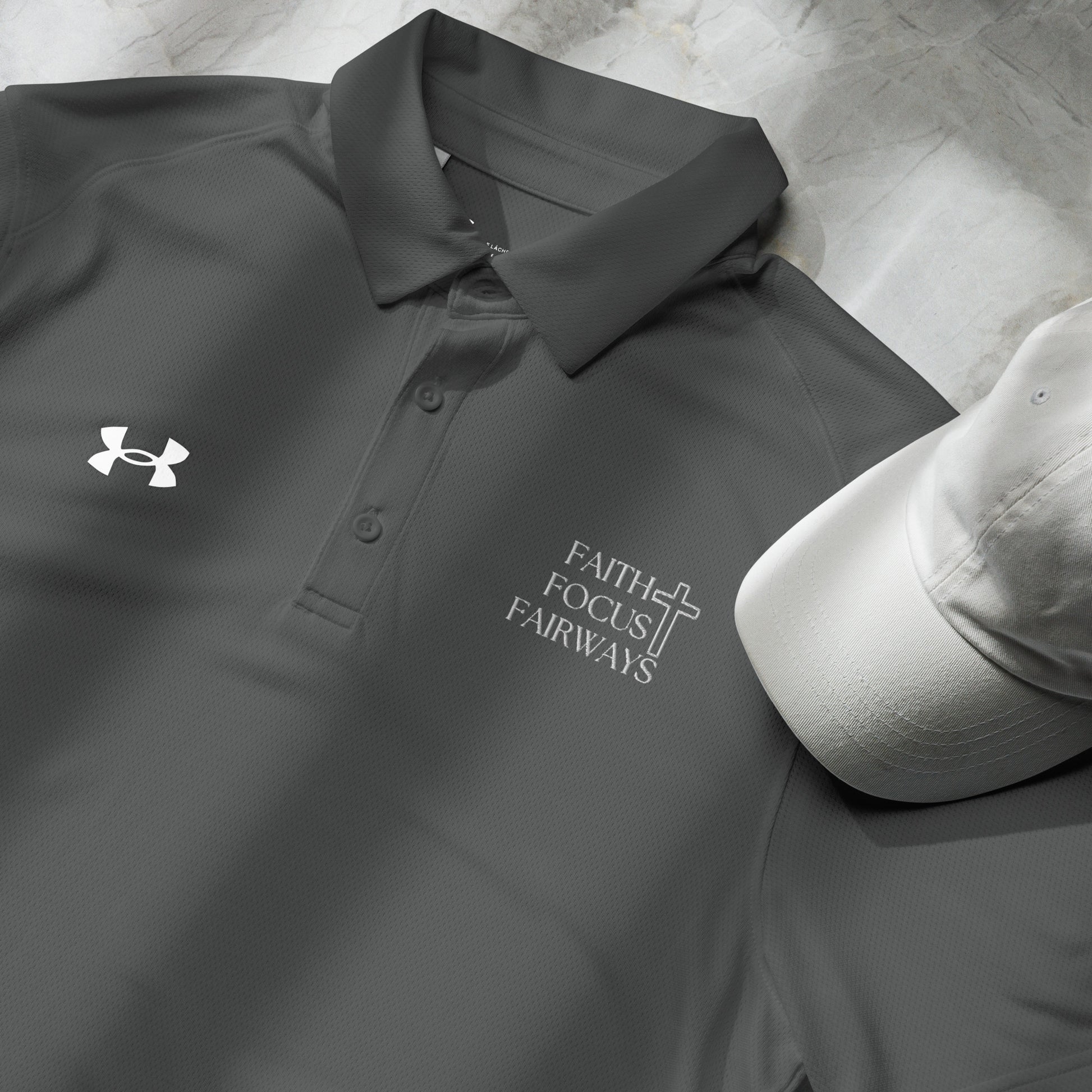 Grey polo with white Faith Focus Fairways message on left chest