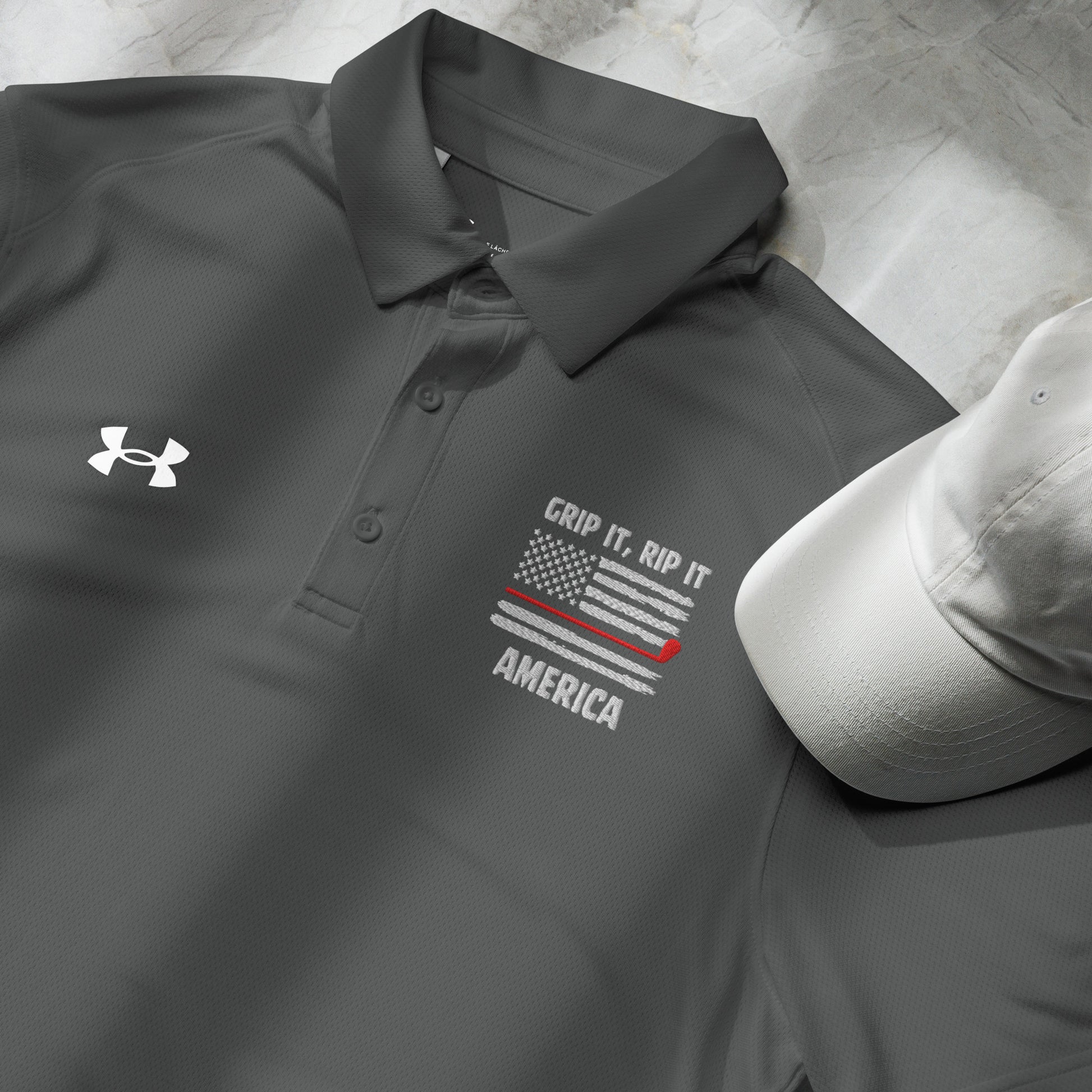 grey performance polo with patriotic grip it rip it slogan front