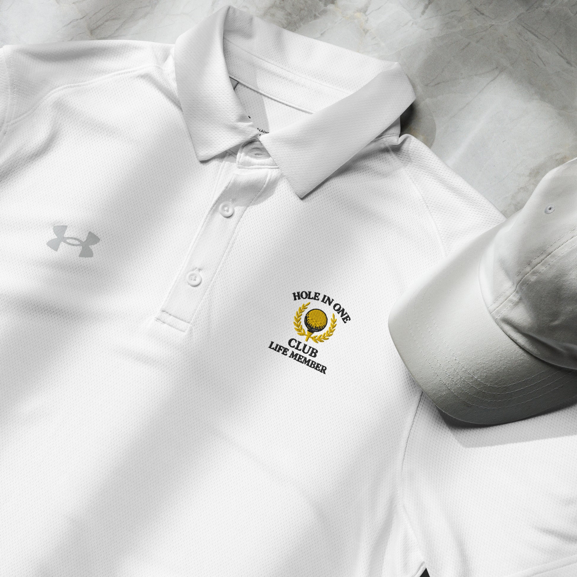 White Hole in One Club Member polo shirt with wording and icon