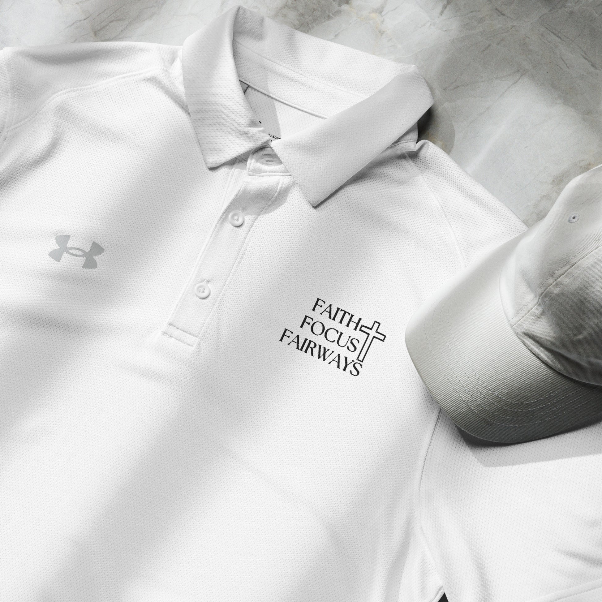White Under Armour polo shirt with Faith Focus Fairways religious text