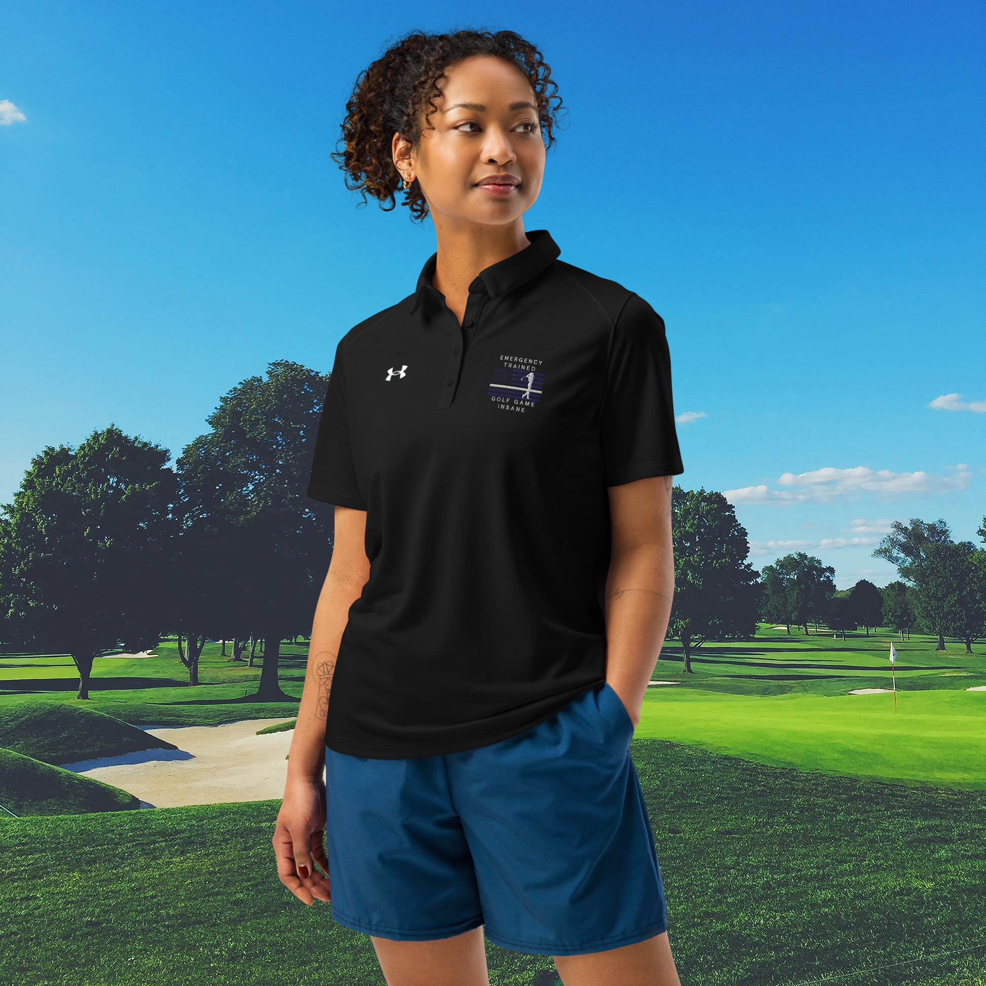 Black emergency medical women's polo with patriotic golf chest artwork
