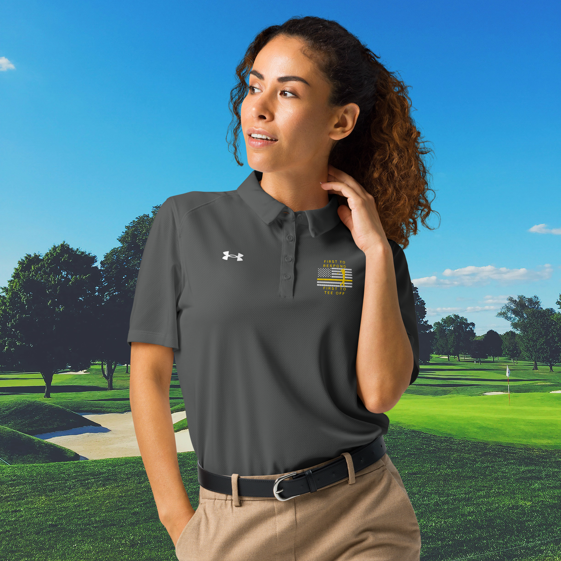 Grey women's Under Armour golf polo with First To Respond First To Tee Off design