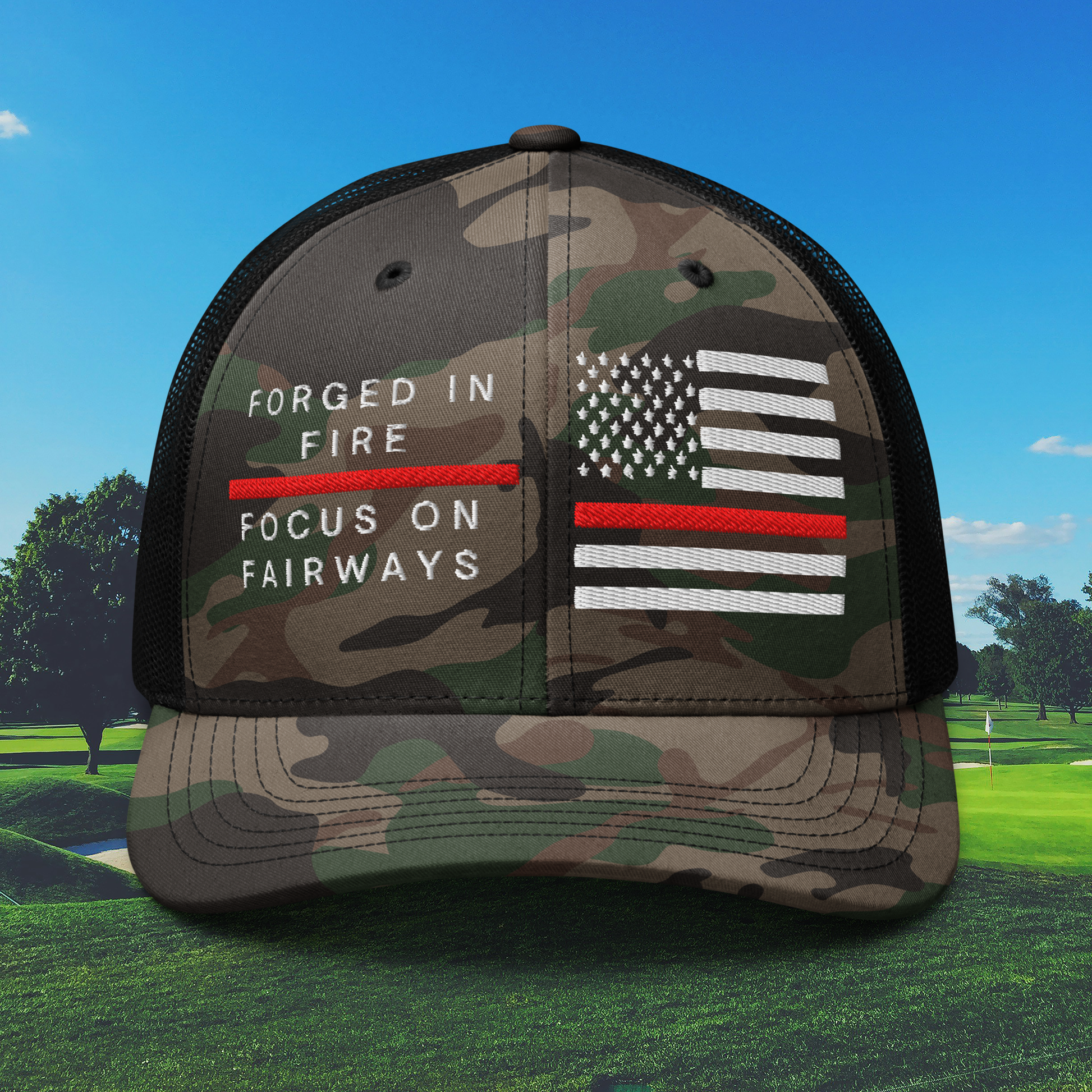 Black women’s camo trucker hat with Forged in Fire Focus on Fairways text