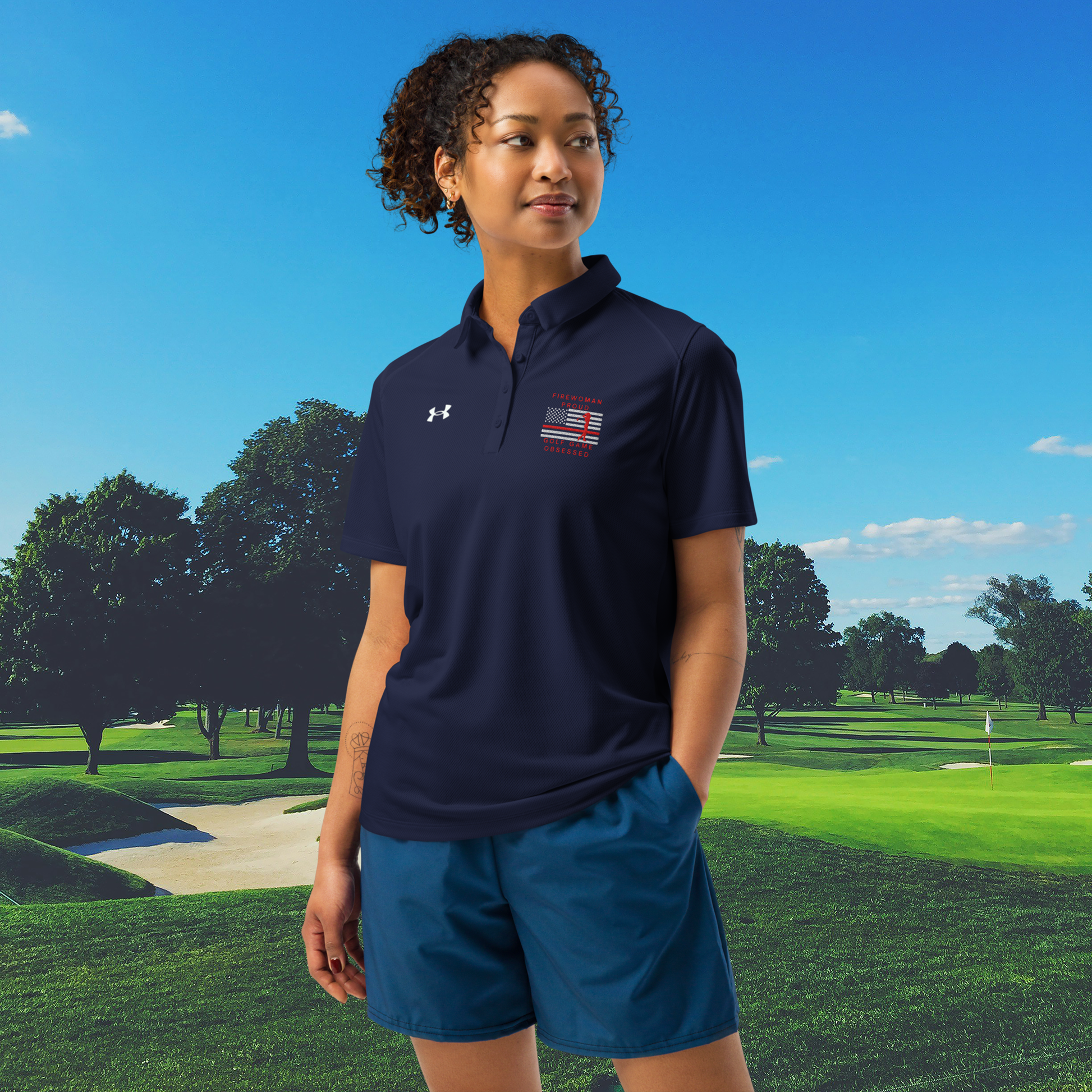 Navy women's Under Armour golf polo with Firewoman Proud Golf Game Obsessed design