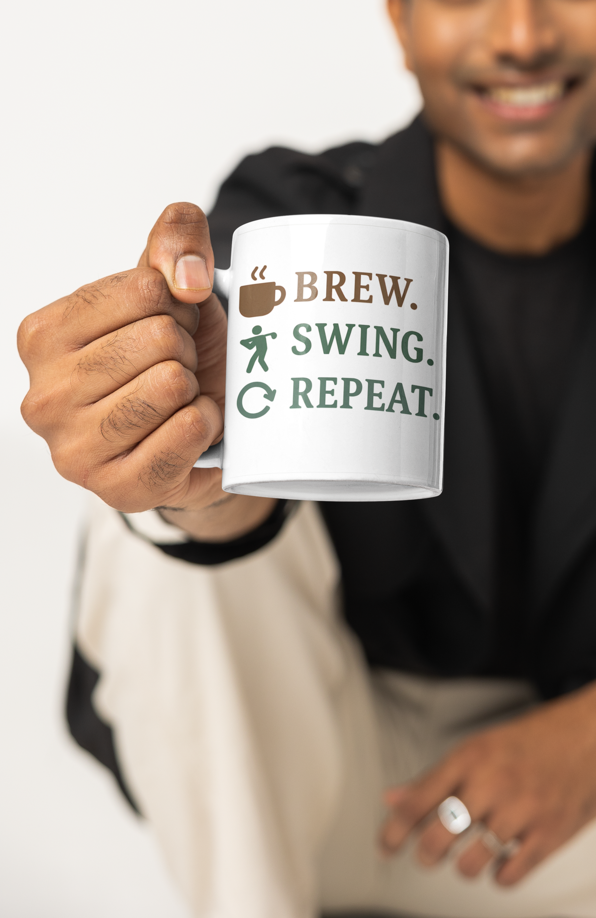 Golf-inspired cup with brew, swing, repeat sequence and symbols