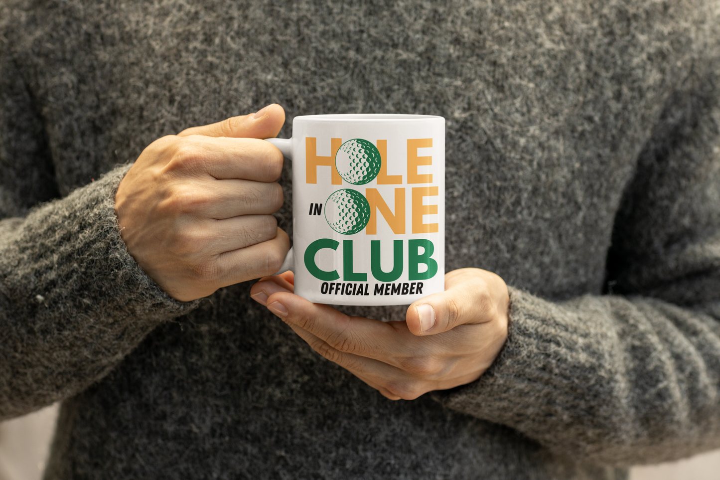 Ceramic cup with stylized typography and golfing icon elements
