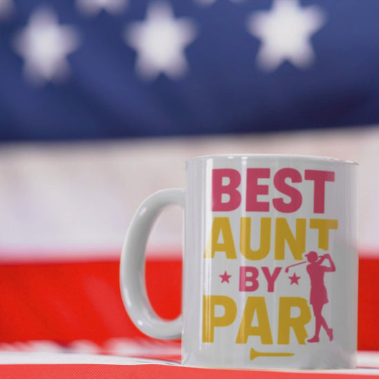 Best aunt by par 11oz coffee mug female golfer silhouette pink yellow lettering