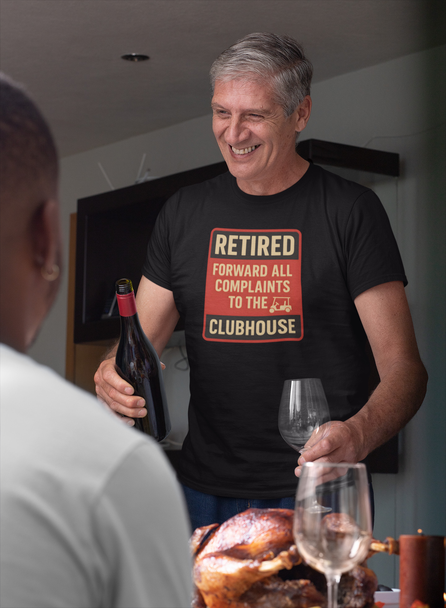 Black shirt featuring retirement clubhouse artwork