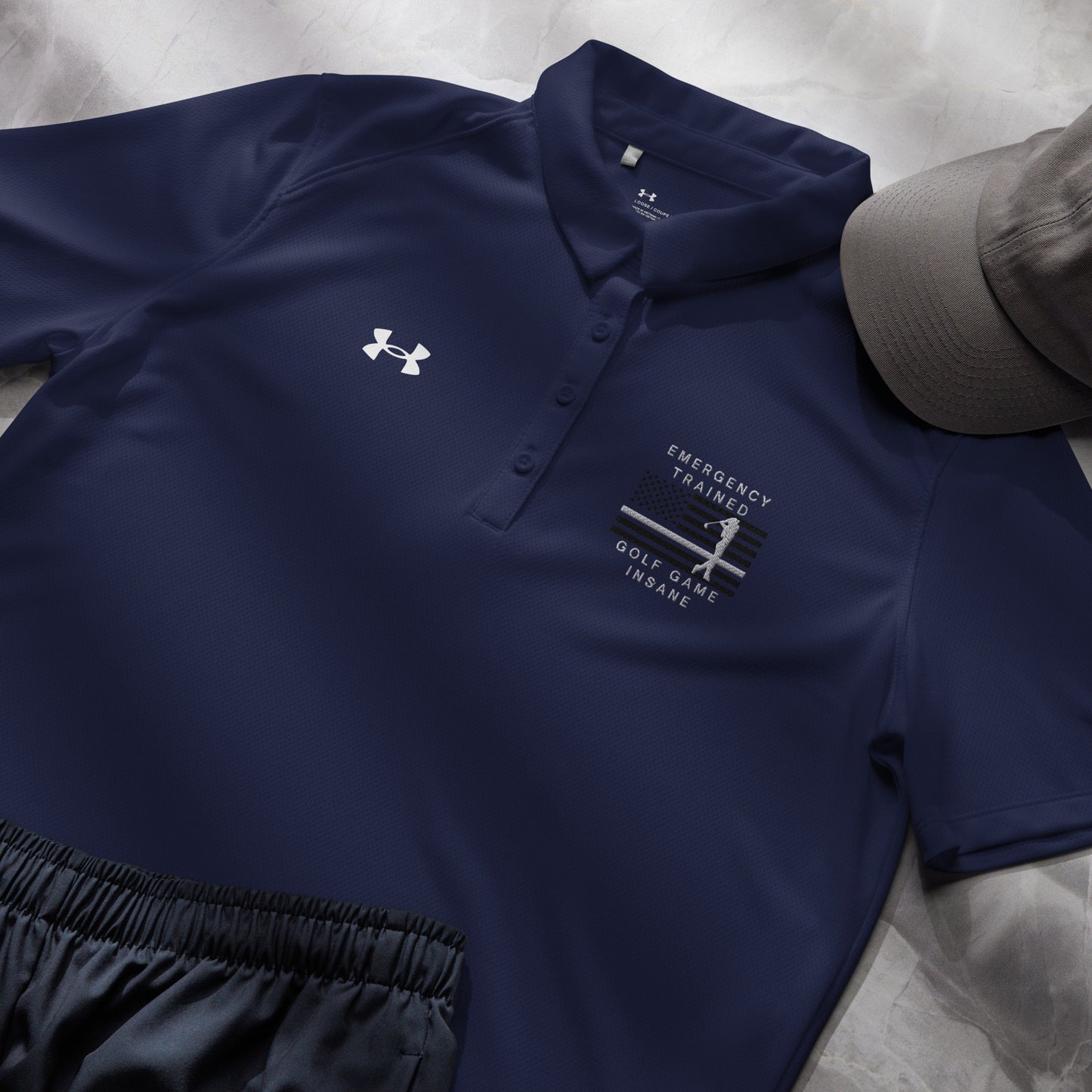 Navy women's Under Armour golf polo with Emergency Trained Golf Game Insane design