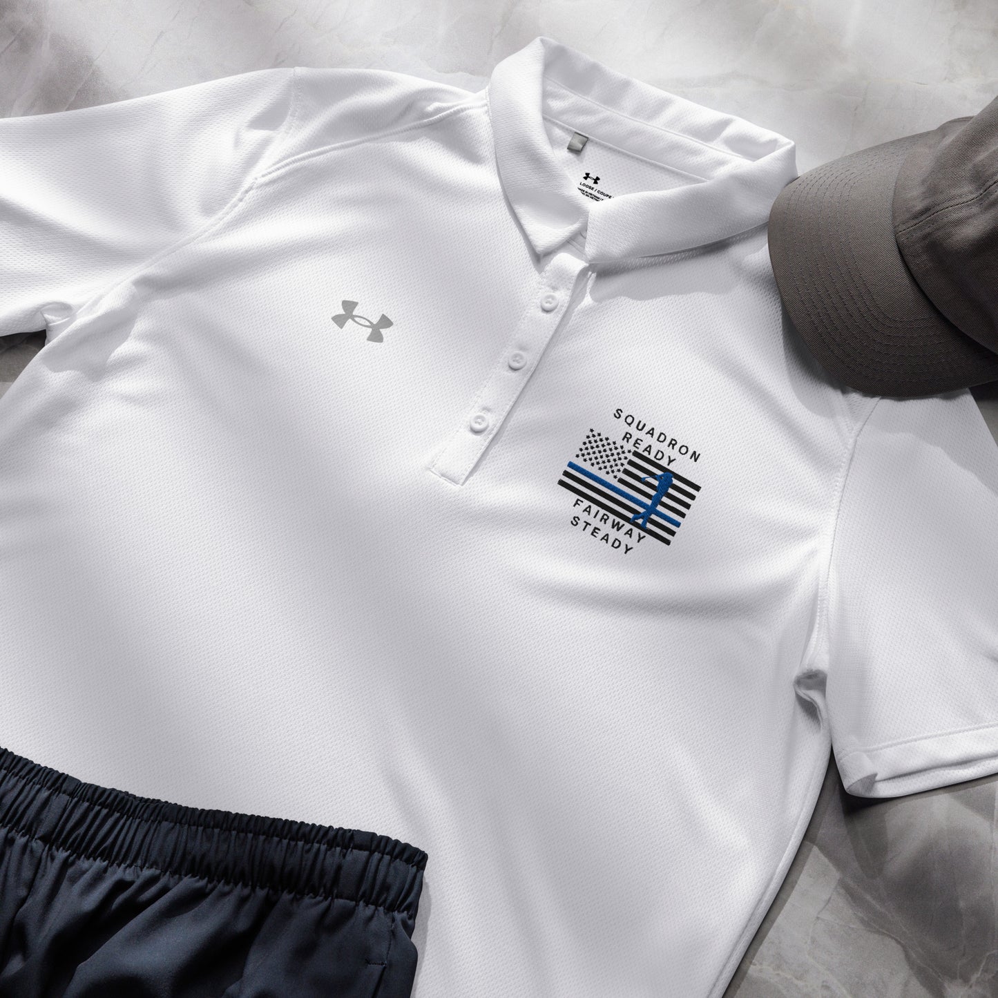 White women’s Under Armour golf polo with Squadron Ready Fairway Steady Air Force design